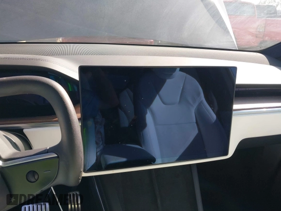 2023 Tesla Model X with VIN 7SAXCBE50PF378548, listed as a IAAI auction lot 41698357 with Not Provided miles and . Bid and sale history available at DreamBid. Image 17.