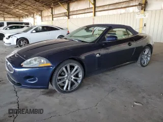 2009 Jaguar XK with VIN SAJWA44B595B28541, listed as a Copart auction lot 80187204 with 71,722 mi miles and Salvage Title. Bid and sale history available at DreamBid. Image 1.
