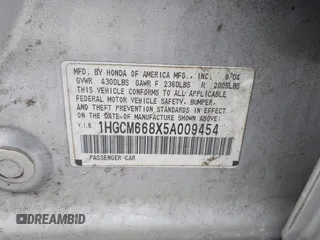 2005 Honda Accord EX-L z VIN 1HGCM668X5A009454, wystawiony jako IAAI lot #41082566 z przebiegiem 206 652 mil mil oraz . Historia ofert i sprzedaży dostępna na DreamBid. Obrazek 9.