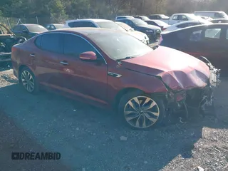 2014 Kia Optima SX Turbo with VIN 5XXGR4A61EG331173, listed as a IAAI auction lot 41656394 with 132,737 mi miles and . Bid and sale history available at DreamBid. Image 1.