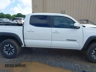 2023 Toyota Tacoma SR with VIN 3TMCZ5AN7PM639378, listed as a IAAI auction lot 42222407 with 38,172 mi miles and . Bid and sale history available at DreamBid. Image 13.