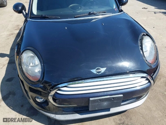 2015 MINI Cooper Hardtop with VIN WMWXM5C51FT941078, listed as a IAAI auction lot 41978808 with 62,682 mi miles. Bid and sale history available at carsss.com. Image 6.