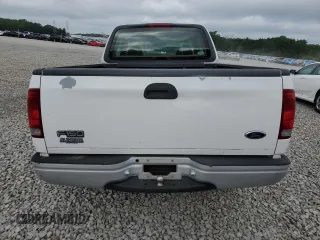 1999 Ford F-150 with VIN 1FTZX1728XNA67734, listed as a Copart auction lot 61195845 with Not provided miles and Salvage title. Bid and sale history available at DreamBid. Image 6.