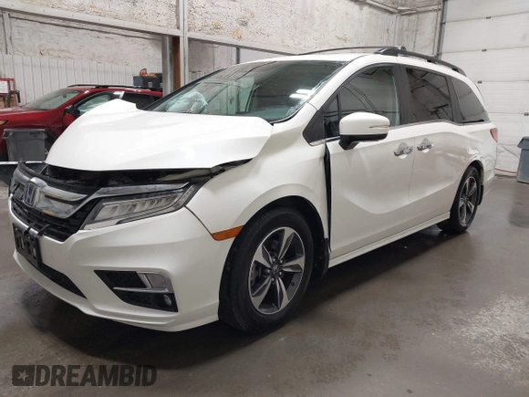 2019 Honda Odyssey Touring with VIN 5FNRL6H8XKB079113, listed as a IAAI auction lot 42359455 with 74,545 mi miles and . Bid and sale history available at DreamBid. Image 2.