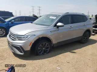 2022 Volkswagen Tiguan SE with VIN 3VV2B7AX9NM014556, listed as a Copart auction lot 60322245 with 80,682 mi miles and Salvage title. Bid and sale history available at DreamBid. Image 1.