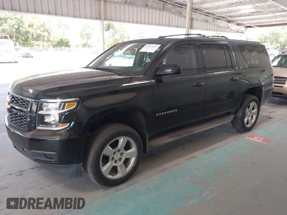 2015 Chevrolet Suburban LT with VIN 1GNSKJKC7FR199544, listed as a IAAI auction lot 42169017 with 219,219 mi miles and . Bid and sale history available at DreamBid. Image 17.