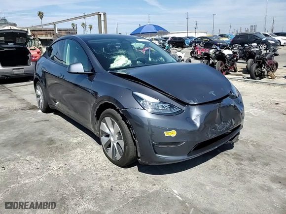 2022 Tesla Model Y Long Range with VIN 7SAYGAEE1NF486077, listed as a Copart auction lot 50526795 with 24,858 mi miles and Salvage Title. Bid and sale history available at carsss.com. Image 11.