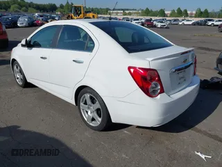 2016 Chevrolet Sonic LTZ z VIN 1G1JE5SB5G4160324, wystawiony jako IAAI lot #42162934 z przebiegiem 56 551 mil mil oraz . Historia ofert i sprzedaży dostępna na DreamBid. Obrazek 3.