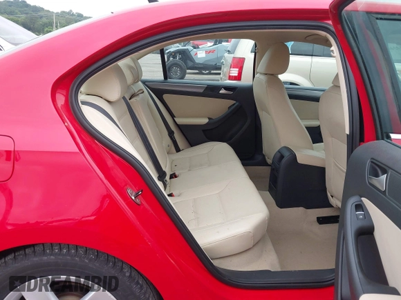 2014 Volkswagen Jetta TDI w/Premium/Nav with VIN 3VWLL7AJ4EM383351, listed as a IAAI auction lot 42424074 with 66,824 mi miles and . Bid and sale history available at DreamBid. Image 8.