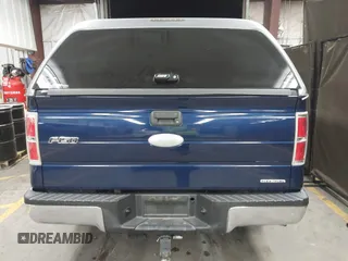 2011 Ford F-150 XL with VIN 1FTFX1CF0BFD42141, listed as a IAAI auction lot 41612837 with 195,235 mi miles. Bid and sale history available at carsss.com. Image 16.