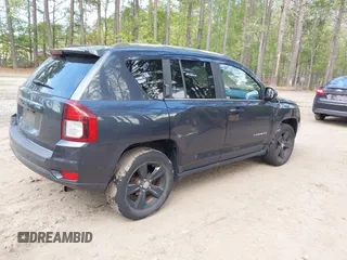 2014 Jeep Compass Sport with VIN 1C4NJDBB5ED776679, listed as a IAAI auction lot 41992146 with 145,706 mi miles. Bid and sale history available at carsss.com. Image 4.