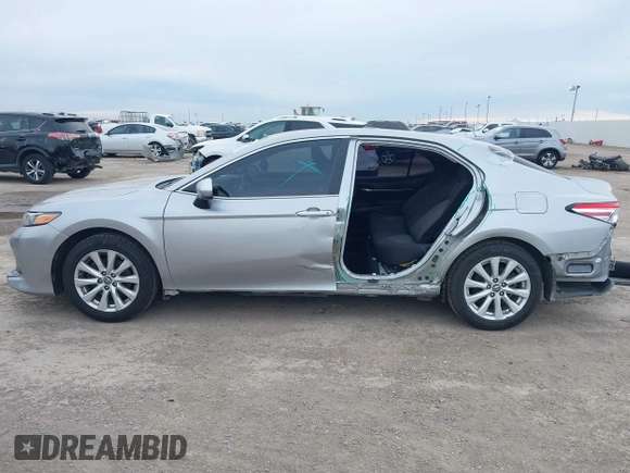 2019 Toyota Camry LE z VIN 4T1B11HK3KU769178, wystawiony jako IAAI lot #41348861 z przebiegiem 121 069 mil mil oraz . Historia ofert i sprzedaży dostępna na DreamBid. Obrazek 15.
