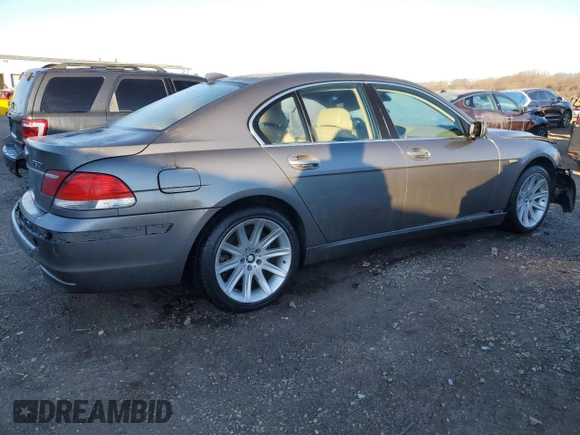 2006 BMW 7 Series 750i with VIN WBAHL83596DT03728, listed as a Copart auction lot 87855795 with 127,513 mi miles and Salvage title. Bid and sale history available at DreamBid. Image 3.