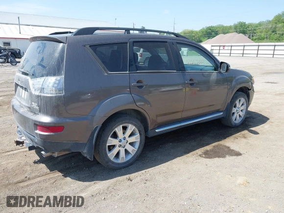 2011 Mitsubishi Outlander SE with VIN JA4AS3AW0BU032083, listed as a IAAI auction lot 42257699 with 160,038 mi miles and . Bid and sale history available at DreamBid. Image 4.