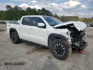 2023 Nissan Frontier Pro-X with VIN 1N6ED1EJ6PN661933, listed as a Copart auction lot 52496135 with 28,533 mi miles and Salvage title. Bid and sale history available at DreamBid. Image 4.
