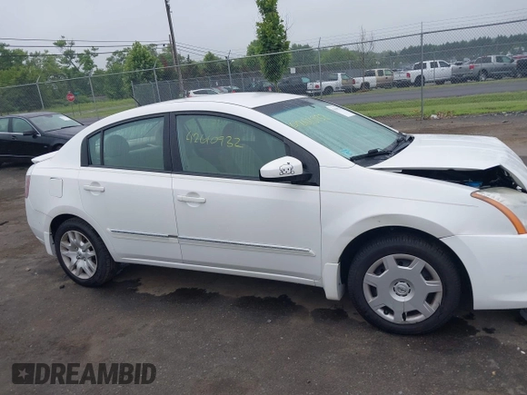 2012 Nissan Sentra S z VIN 3N1AB6APXCL636612, wystawiony jako IAAI lot #42610932 z przebiegiem 150 605 mil mil oraz . Historia ofert i sprzedaży dostępna na DreamBid. Obrazek 13.