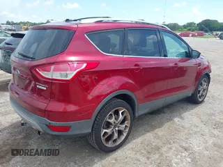 2013 Ford Escape Titanium with VIN 1FMCU0J96DUC67636, listed as a IAAI auction lot 42539425 with 120,593 mi miles and . Bid and sale history available at DreamBid. Image 4.