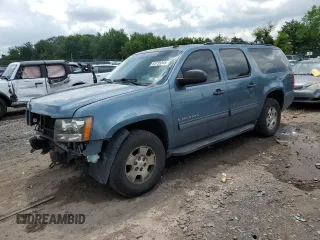 2010 Chevrolet Suburban LS with VIN 1GNUKHE33AR245179, listed as a Copart auction lot 63735545 with 176,565 mi miles and Salvage title. Bid and sale history available at DreamBid. Image 1.