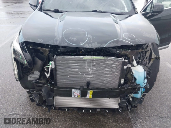 2020 Cadillac XT4 FWD Premium Luxury with VIN 1GYFZCR49LF049541, listed as a IAAI auction lot 42249189 with 62,846 mi miles and . Bid and sale history available at DreamBid. Image 6.