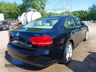 2014 Volkswagen Passat SE с VIN 1VWBN7A37EC002696, выставлен на аукционе IAAI как лот 42308028 с пробегом 165 111 миль миль и . История ставок и продаж доступна на DreamBid. Изображение 4.