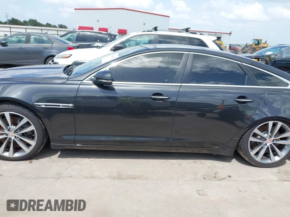 2015 Jaguar XJ с VIN SAJWA3HT3FMV86221, выставлен на аукционе IAAI как лот 42628203 с пробегом 125 951 миль миль и . История ставок и продаж доступна на DreamBid. Изображение 14.