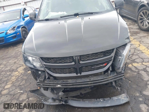2019 Dodge Journey Crossroad with VIN 3C4PDCGGXKT717700, listed as a IAAI auction lot 41519645 with 105,985 mi miles and . Bid and sale history available at DreamBid. Image 6.