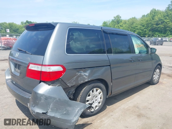 2007 Honda Odyssey LX with VIN 5FNRL38267B029066, listed as a IAAI auction lot 42502433 with 185,721 mi miles and . Bid and sale history available at DreamBid. Image 4.