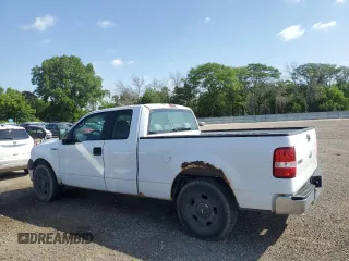 2007 Ford F-150 STX with VIN 1FTRX12W47FB00233, listed as a Copart auction lot 61870565 with 205,846 mi miles and Clean title. Bid and sale history available at DreamBid. Image 2.