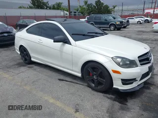 2014 Mercedes-Benz C 250 with VIN WDDGJ4HB6EG184292, listed as a IAAI auction lot 42183329 with 122,449 mi miles and . Bid and sale history available at DreamBid. Image 1.