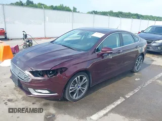 2017 Ford Fusion Titanium z VIN 3FA6P0K94HR271307, wystawiony jako IAAI lot #42595411 z przebiegiem 100 344 mil mil oraz . Historia ofert i sprzedaży dostępna na DreamBid. Obrazek 20.