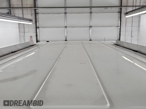 2018 Ford Transit with VIN 1FTYR1YG2JKB43974, listed as a IAAI auction lot 41852638 with 104,713 mi miles and . Bid and sale history available at DreamBid. Image 4.