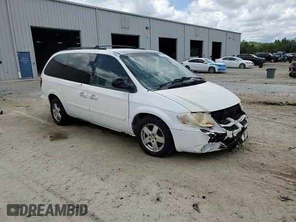 2005 Dodge Caravan SXT z VIN 2D4GP44L15R380469, wystawiony jako Copart lot #58800775 z przebiegiem Nie podano mil oraz Szkoda całkowita • Salvage title. Historia ofert i sprzedaży dostępna na DreamBid. Obrazek 14.