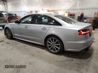2018 Audi A6 z VIN WAUF3BFC9JN077658, wystawiony jako Copart lot #44328305 z przebiegiem 66 103 mil mil oraz Czysty tytuł • Clean title. Historia ofert i sprzedaży dostępna na DreamBid. Obrazek 2.