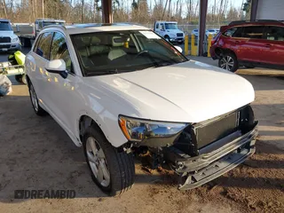 2021 Audi Q3 Premium with VIN WA1AUCF37M1087692, listed as a IAAI auction lot 41277380 with 66,039 mi miles and . Bid and sale history available at DreamBid. Image 1.