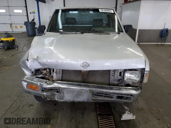 1987 Nissan Hardbody E z VIN JN6ND11S1HW006640, wystawiony jako Copart lot #78160004 z przebiegiem 403 406 mil mil oraz Szkoda całkowita • Salvage title. Historia ofert i sprzedaży dostępna na DreamBid. Obrazek 11.
