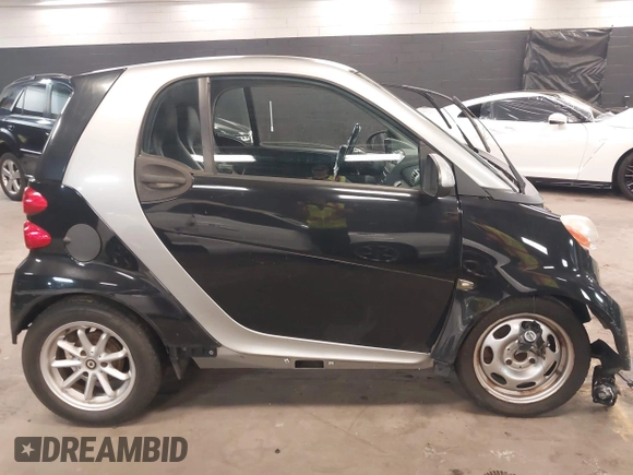 2010 Smart fortwo Pure with VIN WMEEJ3BA7AK402342, listed as a IAAI auction lot 42417829 with 38,225 mi miles and . Bid and sale history available at DreamBid. Image 13.