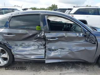 2020 Honda Accord Touring z VIN 1HGCV2F93LA023062, wystawiony jako IAAI lot #42596772 z przebiegiem 53 586 mil mil oraz . Historia ofert i sprzedaży dostępna na DreamBid. Obrazek 6.