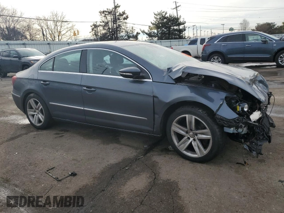 2013 Volkswagen CC Sport with VIN WVWBP7AN6DE570603, listed as a Copart auction lot 42858115 with 122,477 mi miles and Salvage Title. Bid and sale history available at carsss.com. Image 4.