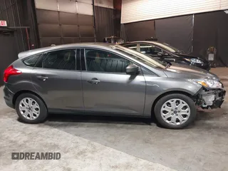 2012 Ford Focus SE with VIN 1FAHP3K22CL394088, listed as a IAAI auction lot 40953085 with 147,259 mi miles and . Bid and sale history available at carsss.com. Image 14.