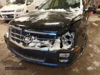 2010 Cadillac STS AWD with VIN 1G6DU6EV2A0125065, listed as a IAAI auction lot 41229886 with 84,954 mi miles and . Bid and sale history available at DreamBid. Image 6.