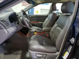 2004 Toyota Camry LE with VIN 4T1BF32K64U072368, listed as a Copart auction lot 51821965 with 136,646 mi miles and Salvage Title. Bid and sale history available at DreamBid. Image 7.