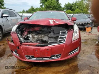 2013 Cadillac XTS Luxury with VIN 2G61P5S33D9121169, listed as a Copart auction lot 56491273 with 125,323 mi miles and Salvage title. Bid and sale history available at DreamBid. Image 5.