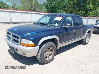 2003 Dodge Dakota SLT with VIN 1D7HL48N63S158682, listed as a IAAI auction lot 41964332 with 278,390 mi miles. Bid and sale history available at carsss.com. Image 2.