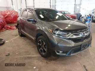 2018 Honda CR-V Touring with VIN 2HKRW2H91JH634457, listed as a IAAI auction lot 41697658 with 101,878 mi miles. Bid and sale history available at carsss.com. Image 1.