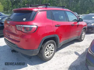 2018 Jeep Compass Sport with VIN 3C4NJCABXJT502717, listed as a IAAI auction lot 41985204 with 124,900 mi miles and . Bid and sale history available at DreamBid. Image 4.