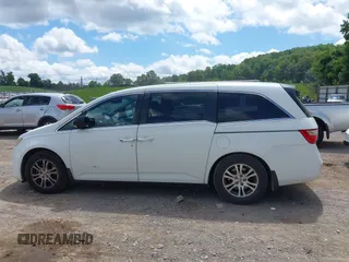 2012 Honda Odyssey EX-L with VIN 5FNRL5H62CB019238, listed as a IAAI auction lot 42524694 with 271,384 mi miles and . Bid and sale history available at DreamBid. Image 14.