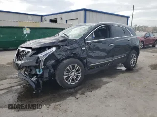 2023 Cadillac XT5 FWD Premium Luxury with VIN 1GYKNCRS0PZ138704, listed as a Copart auction lot 86849104 with 44,398 mi miles and Non Repairable. Bid and sale history available at carsss.com. Image 1.