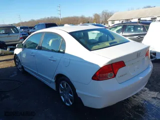 2006 Honda Civic Sdn LX with VIN 1HGFA16596L097028, listed as a IAAI auction lot 41561514 with 73,153 mi miles. Bid and sale history available at carsss.com. Image 3.