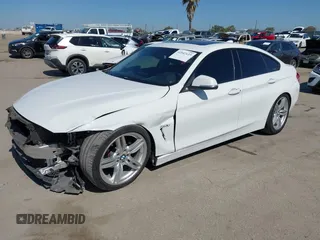2015 BMW 4 Series 428i with VIN WBA4A9C50FGL85857, listed as a IAAI auction lot 42542619 with 136,411 mi miles and . Bid and sale history available at DreamBid. Image 2.