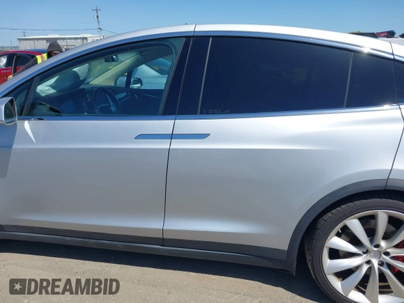 2016 Tesla Model X P90D with VIN 5YJXCAE49GF001067, listed as a IAAI auction lot 41980455 with 94,746 mi miles. Bid and sale history available at carsss.com. Image 14.